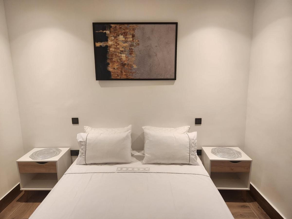 Modern Luxury Retreat: 2-Bedroom Apartment In The Heart Of Marrakech Марракеш Экстерьер фото